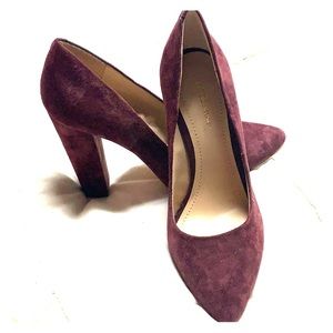 Pair of eggplant purple suede block pumps.